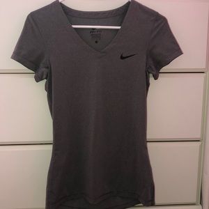 Grey Nike v-neck short sleeve shirt